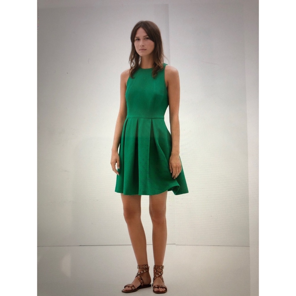 Beautiful green open back dress w/side pockets.